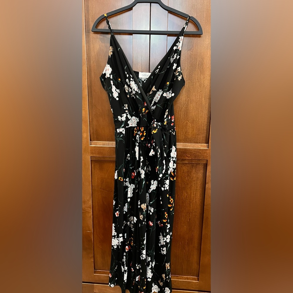 Black Floral Kaleigh Romper with pockets and side tie from Stitchfix